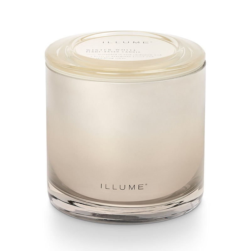 Bougie parfumée cardamome, feuilles persistantes et éclats d'agrumes en verre avec couvercle 590g Illume - Winter White 