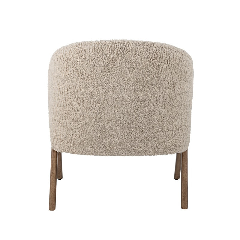 Fauteuil en tissu bouclé et pieds en bois style scandinave Bloomingville - Camino 